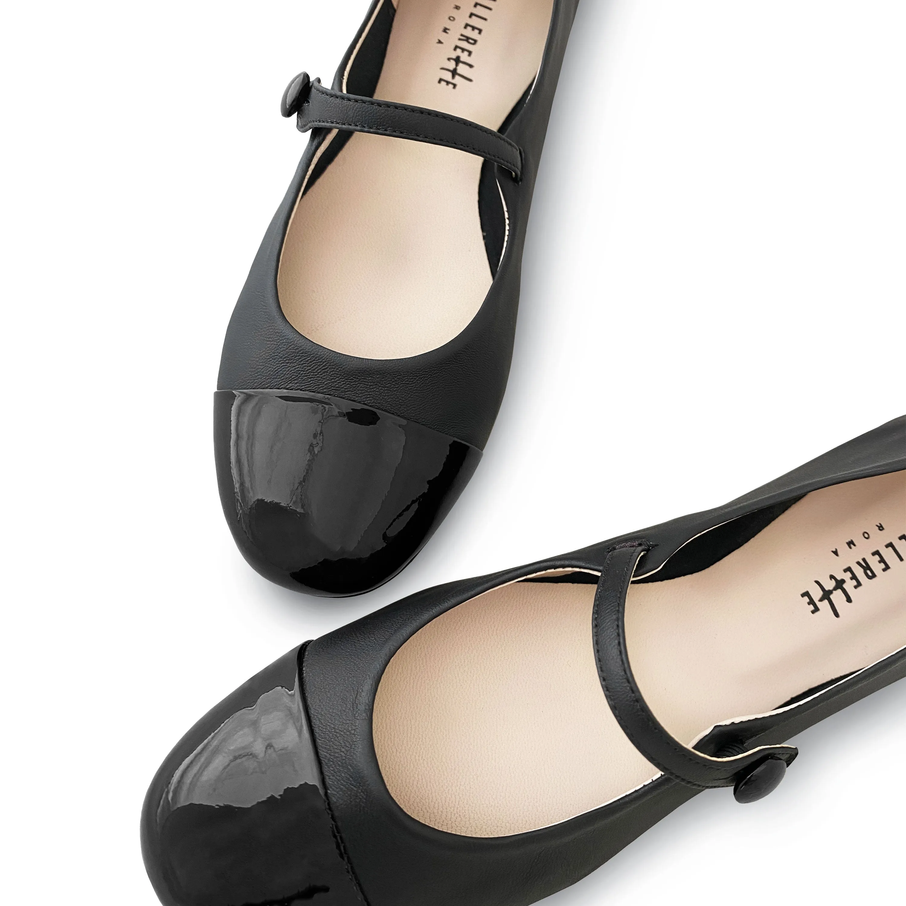 Black ballet flats with black patent toe and strap