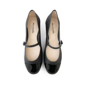 Black ballet flats with black patent toe and strap