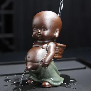Buddha Statue with Monk and Fountain