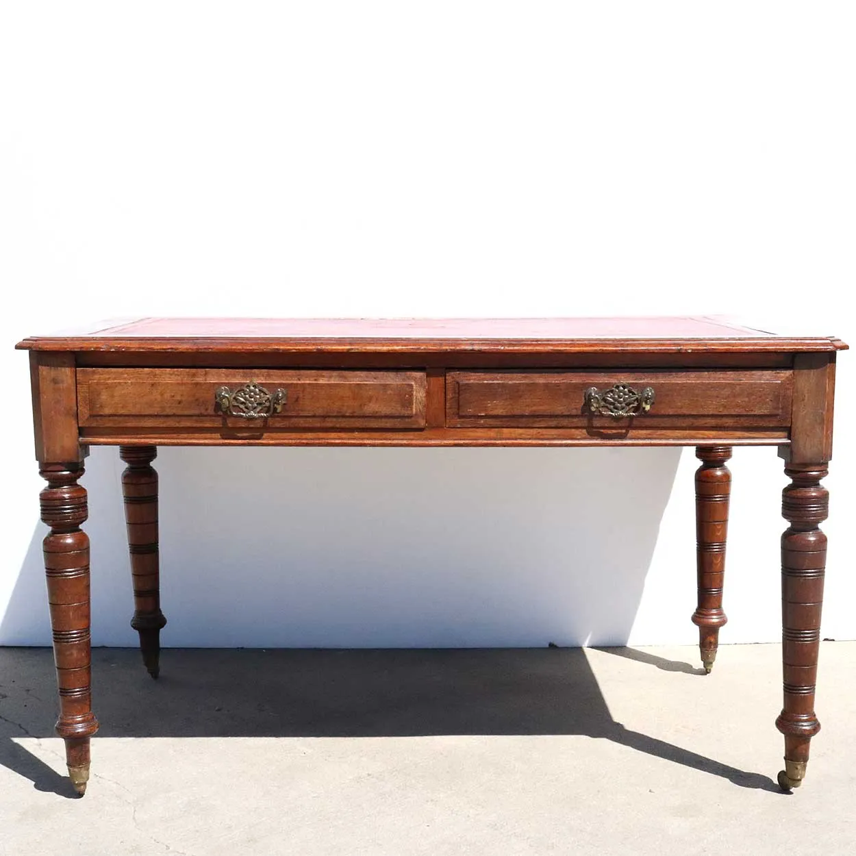 English Victorian Leather Top Quarter Sawn Oak Writing Desk on Casters
